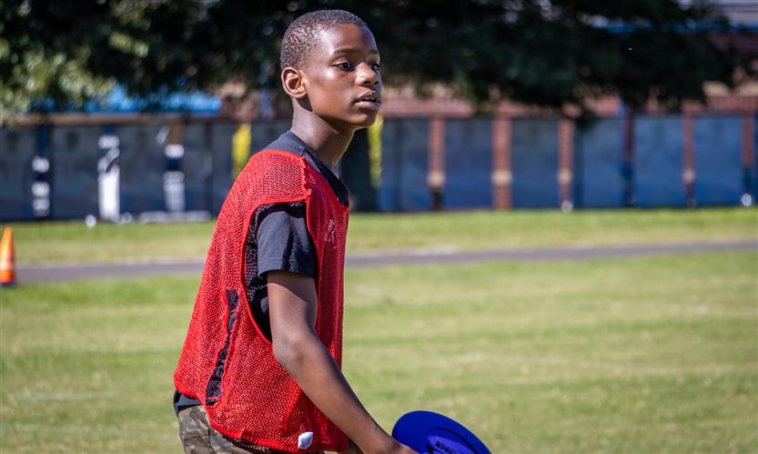 Students play ultimate frisbee